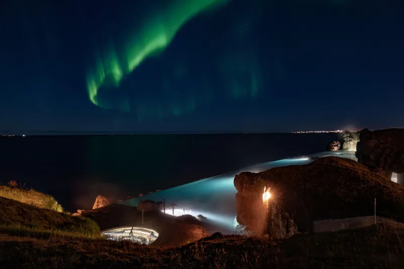 Northern Lights over the Sky Lagoon on a clear winter night
